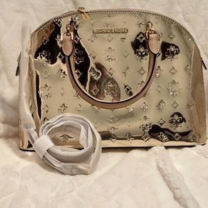 Michael kors large dome Emmy